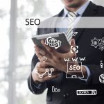 A business man looking at a tablet