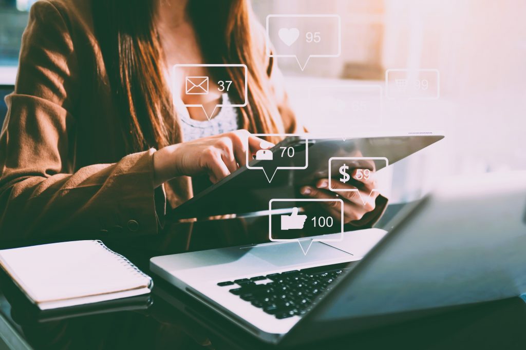 Girl on computer social media marketing